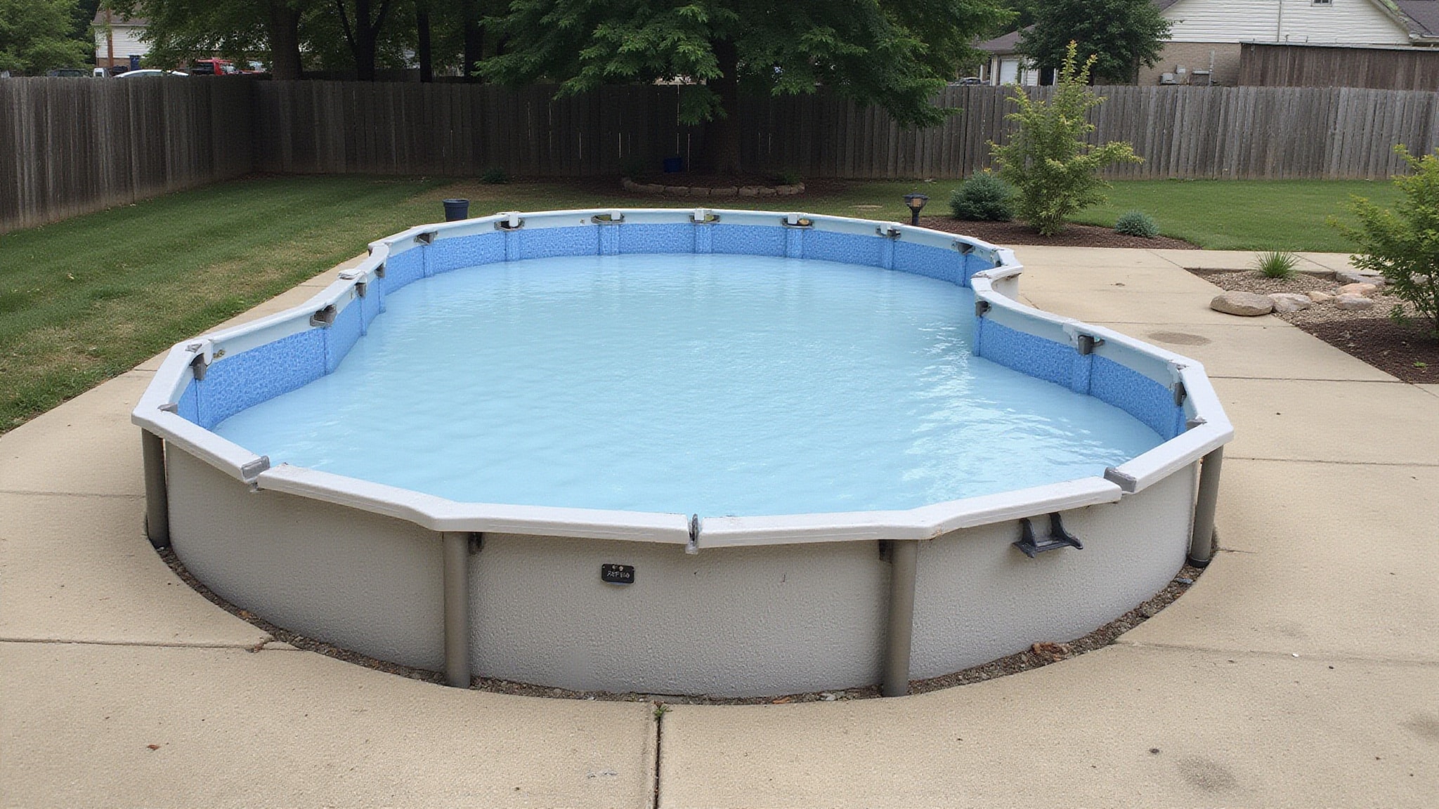 above ground pool on concrete level