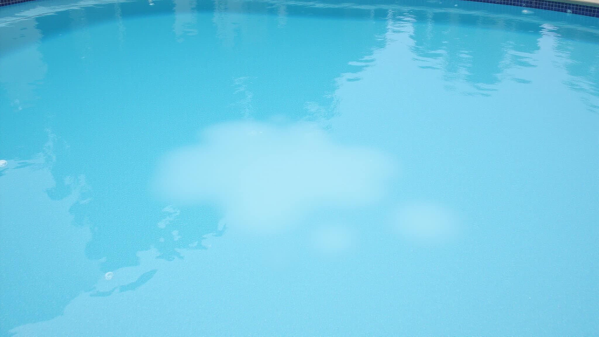 too much chlorine cloudy pool