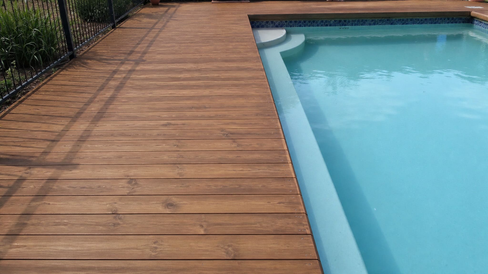 best pool deck resurfacing material